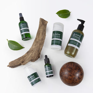 Aether health skincare products. Topshot. Minimal, green, natural skincare products.