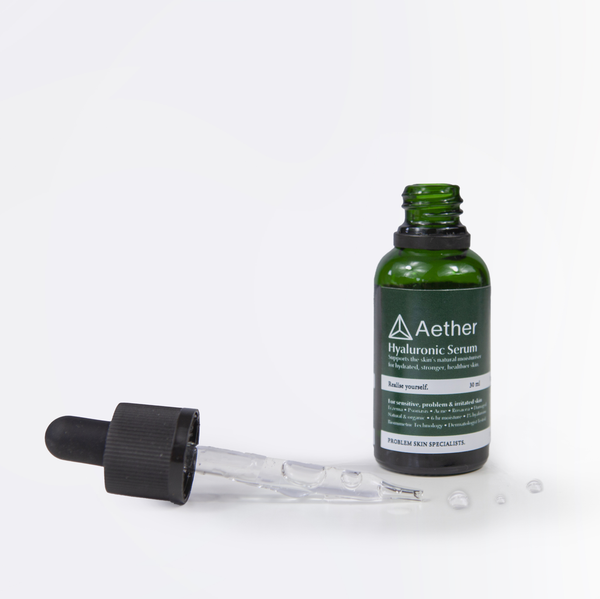 Load image into Gallery viewer, Aether Health&#39;s Hyaluronic Acid Serum open.
